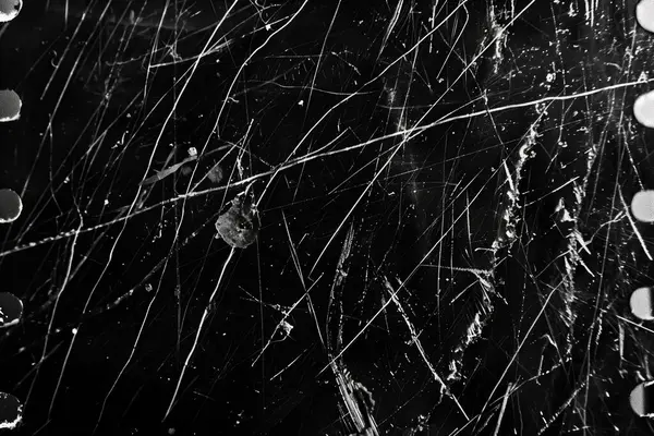 old scratched film background close up