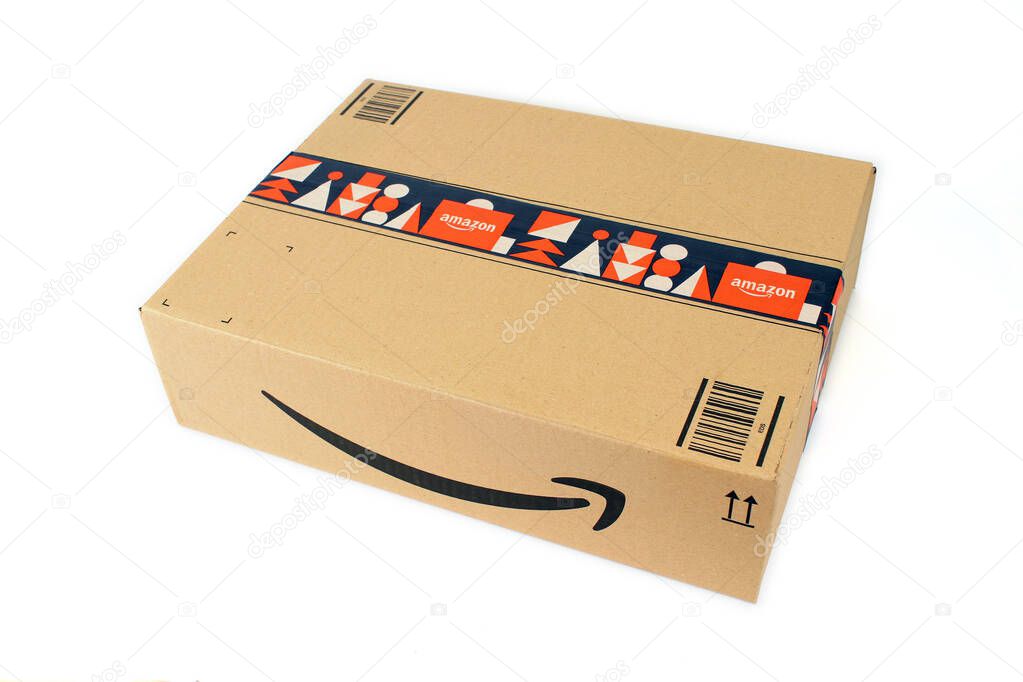 USA, year 2022, typical Amazon Prime cardboard box for online commerce on the white background