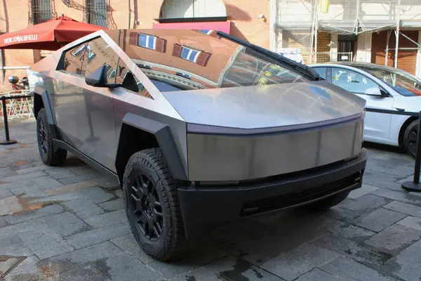 stock image Modena, Italy, may 4 2024, Tesla model Cybertruck, left side, Motor Valley Fest public exhibition, grey color, editorial