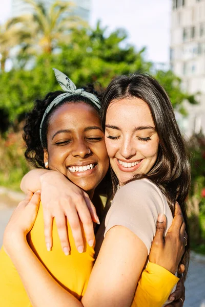 Vertical Portrait Candid Happy Multiracial Best Women Friends Embracing Outdoors — Stock Photo, Image