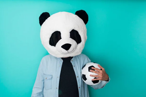 Man Panda Masker Houden Voetbal Bal Blauwe Achtergrond Sport Concept — Stockfoto