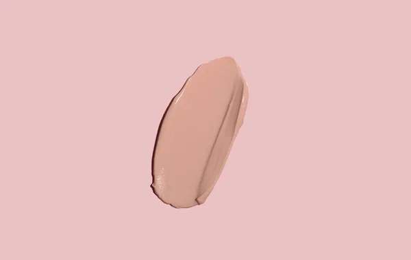Cosmetische Vlek Van Crème Textuur Een Roze Achtergrond Toning Crème — Stockfoto