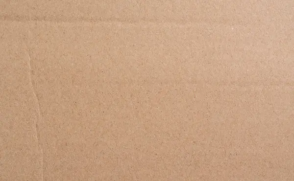 Beige cardboard texture. Ribbed cardboard.