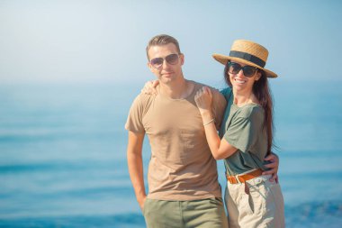 Romantic couple in love walking on the beach on romantic honeymoon travel