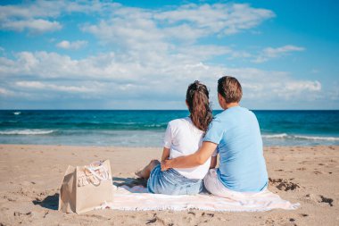 Romantic couple in love walking on the beach on romantic honeymoon travel