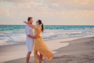 Romantic couple in love walking on the beach on romantic honeymoon travel