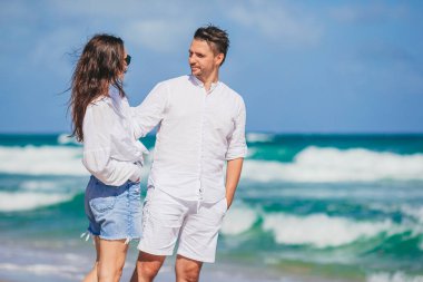 Romantic couple in love on the beach on romantic honeymoon travel