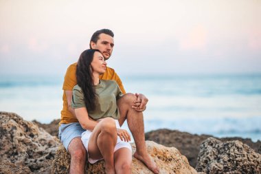 Romantic couple in love on the beach on romantic honeymoon travel