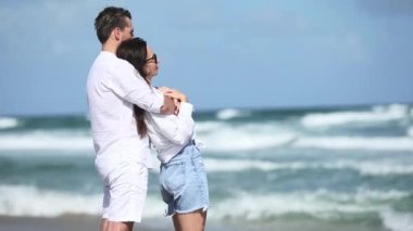 Young couple spending time together on the beach