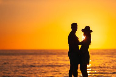 Romantic couple in love on the beach on romantic honeymoon travel