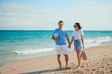 Romantic couple in love on the beach on romantic honeymoon travel