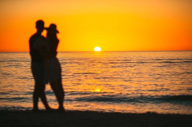 Romantic couple in love walking on the beach on romantic honeymoon travel