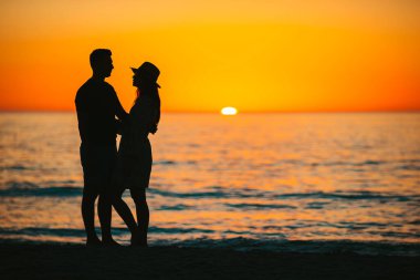 Romantic couple in love on the beach on romantic honeymoon travel