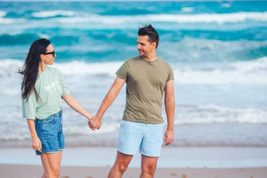 Romantic couple in love on the beach on romantic honeymoon travel