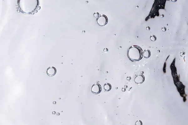 Underwater bubble texture on white background. Water with bubbles. Air bubbles underwater