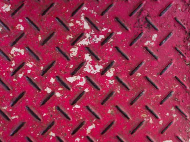 Eski, kaymayan çelik geçit. Arka planda desen dokusu paslanması.