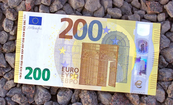 Tweehonderd Euro Close Een Achtergrond Van Zeestenen — Stockfoto