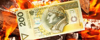 Yangının arka planında 200 Polonyalı zloti. Polonya-Litvanya Cumhuriyeti Ulusal Para Birimi