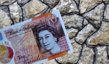 Geçmişe yakın planda İngiliz sterlini. Büyük Britanya ulusal para birimi