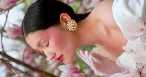 Asian Woman Enjoying Nature Touching Flowers Garden Blooming Magnolia — Vídeos de Stock