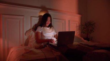Depressed Asian woman cannot sleep insomnia suffering from insomnia lying in bed.