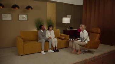 Asian girl and African guy have problems in a relationship a doctors appointment. High quality 4k footage