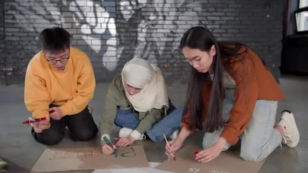 Group Young People Draw Posters Protest Environmental Pollution — Stockvideo