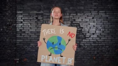 A group of protesting youth are protesting against environmental pollution, global warming