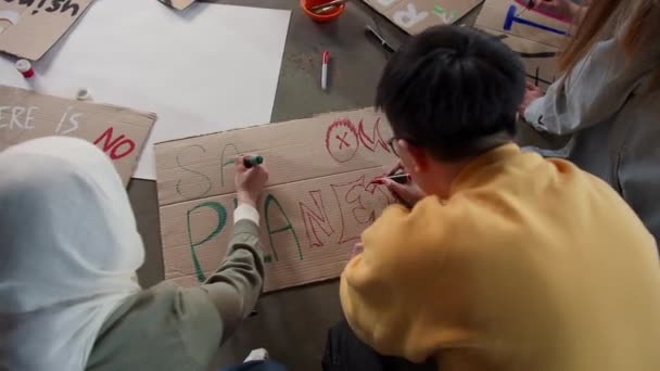 Group Young People Draw Posters Protest Environmental Pollution — ストック動画