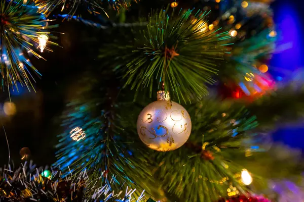 christmas decorations on a fir branch.