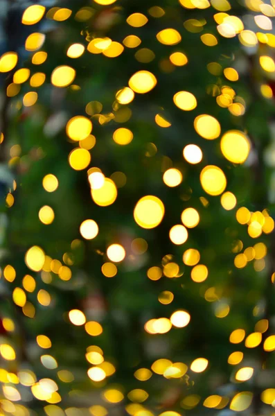Abstraction of blurry, colored lights of festive lighting