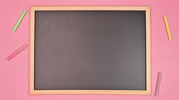 School Blackboard Sponge Chalks Appear Pastel Pink Background Flat Lay — Vídeos de Stock