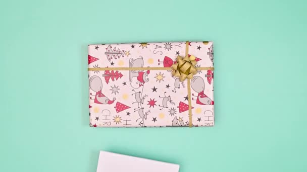 Christmas Gift Copy Space Paper Appear Pastel Blue Background Flat — Wideo stockowe