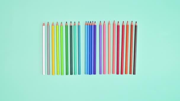 Colorful Pencils Moving Bright Blue Background Stop Motion Flat Lay — Vídeos de Stock