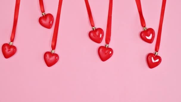 Hanged Hearts Swing Pastel Pink Background Flat Lay Stop Motion — Vídeos de Stock