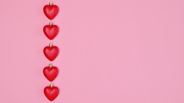 Valentine Day Hearts Passing Pastel Pink Background Copy Space Flat — Stockvideo
