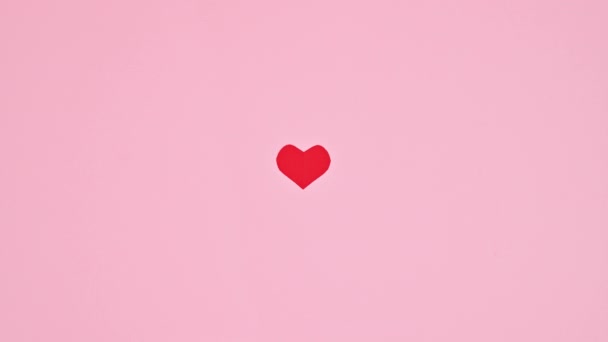 Valentine Day Beating Heart Pastel Pink Background Stop Motion Flat — Vídeo de Stock