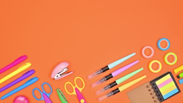 Copy Space Orange Background Moving School Stationery Flat Lay Copy — Stock video