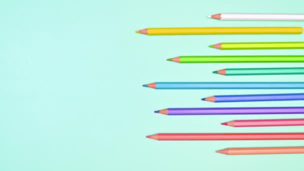 Pastel Colorful Wooden Pencils Move Right Side Pastel Cyan Background — Video Stock