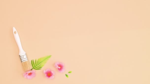 Spring Floral Arrangement Left Side Pastel Orange Background Stop Motion — ストック動画