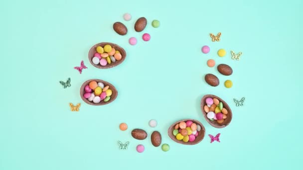Easter Chocolate Eggs Candies Arrangement Moving Pastel Blue Background Copy — 비디오