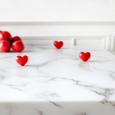 Three red hearts on a marble countertop with apples in the background. clipart