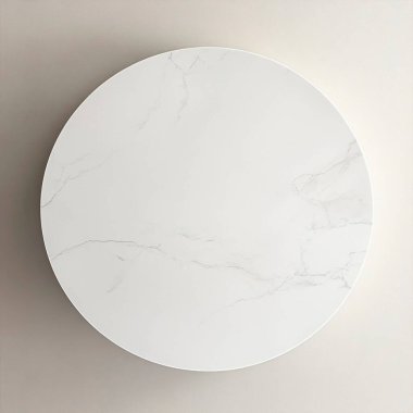 Elegant round marble table with subtle gray veins, showcasing modern design. clipart