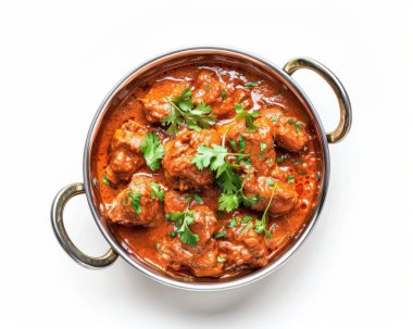 A vibrant bowl of tender meat curry garnished with fresh herbs, showcasing rich colors and textures. clipart