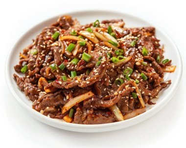 Delicious plate of caramelized beef stir-fry topped with sesame seeds and green onions. clipart