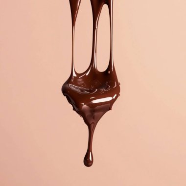 Rich Chocolate Drizzle Mid-Air - Luxurious Dessert Photography clipart