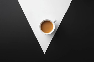 Minimalist Coffe Cup on Black and White Split Surface  Clean and Elegant Design clipart