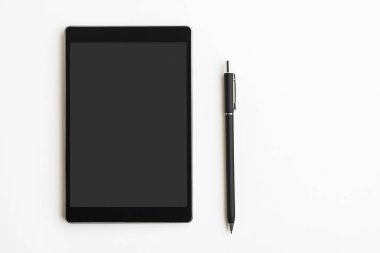 Minimalist Tablet and Pen Mockup on a Clean White Desk with Plant clipart