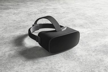 Modern VR Headset on Concrete Surface - Minimalistic Product Display clipart