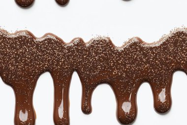 Melted Chocolate with Glitter on White Background clipart